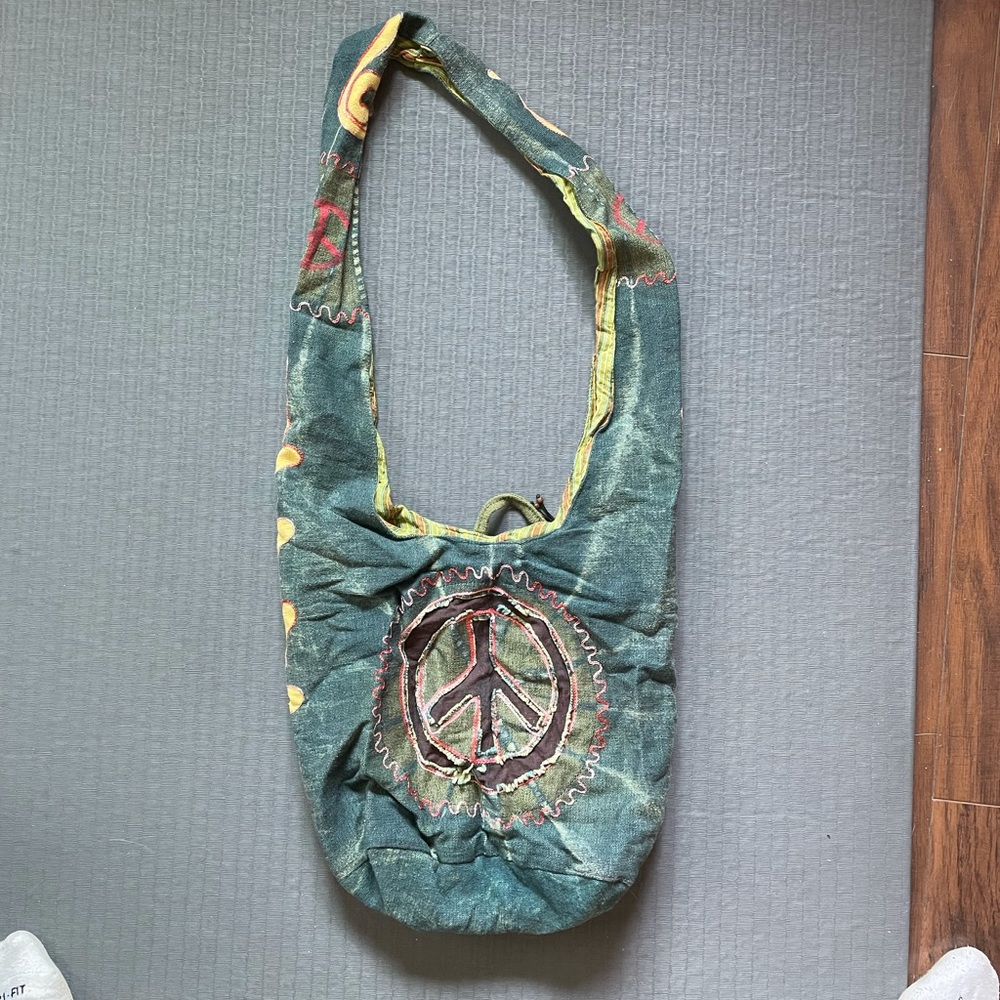 Rising International Canvas Sling Bag